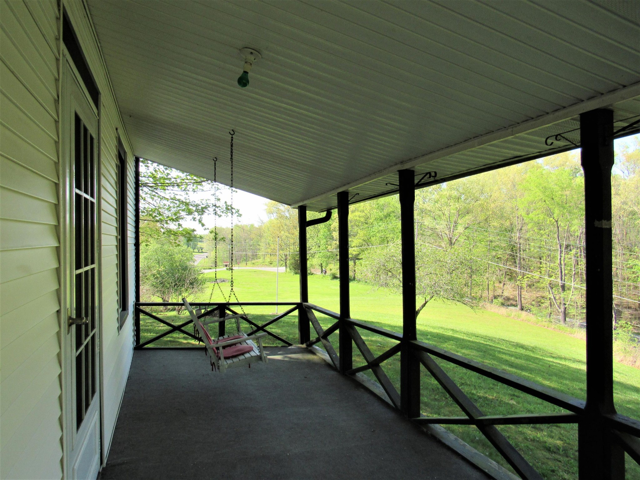 119 Andy Cooper Road Lancing, TN 37770 - Photo 22 of 35 a view of a room with yard and furniture