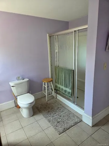 a bathroom with a toilet and a sink