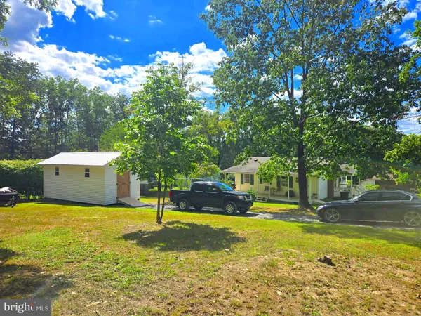 a view of a house with swimming pool
