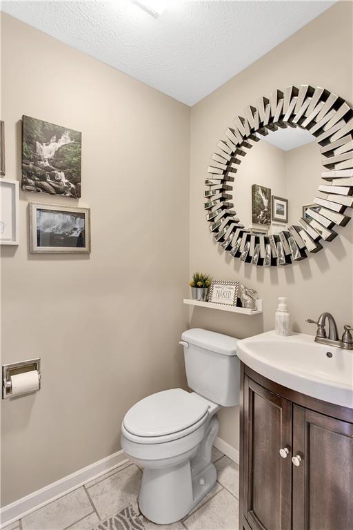 735 Sebring Road Beaver, PA 15009 - Photo 8 of 25 a bathroom with a sink mirror and toilet