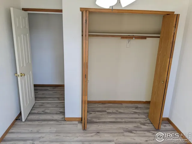 a bathroom with a shower and a toilet