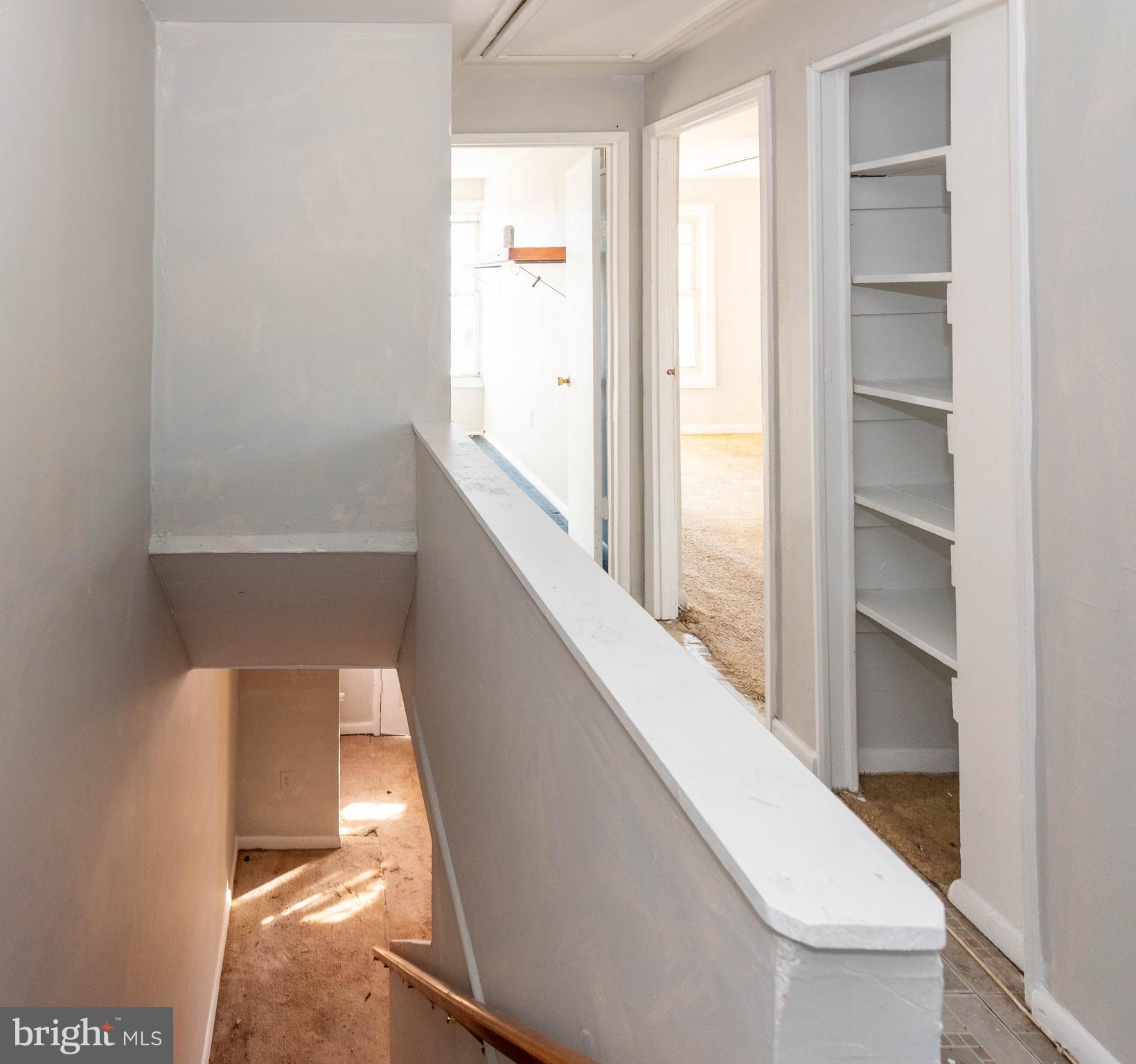 2038 Larkhall Road Dundalk, MD 21222 - Photo 20 of 28 a view of a hallway with wooden floor and entryway
