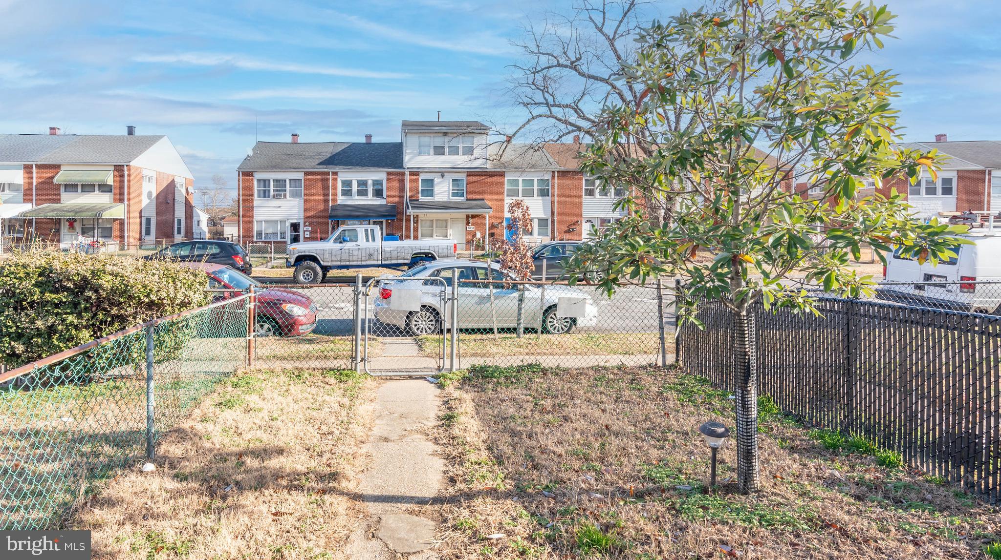 2038 Larkhall Road Dundalk, MD 21222 - Photo 26 of 28 a view of a house with backyard and sitting area