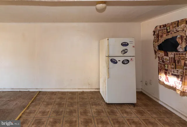a bathroom with a sink a toilet and bathtub