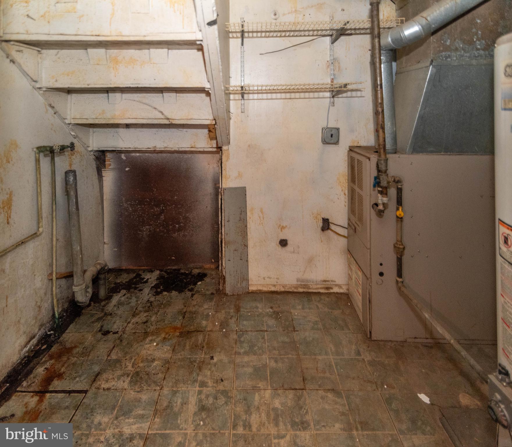 2038 Larkhall Road Dundalk, MD 21222 - Photo 10 of 28 a view of a small room with wooden walls