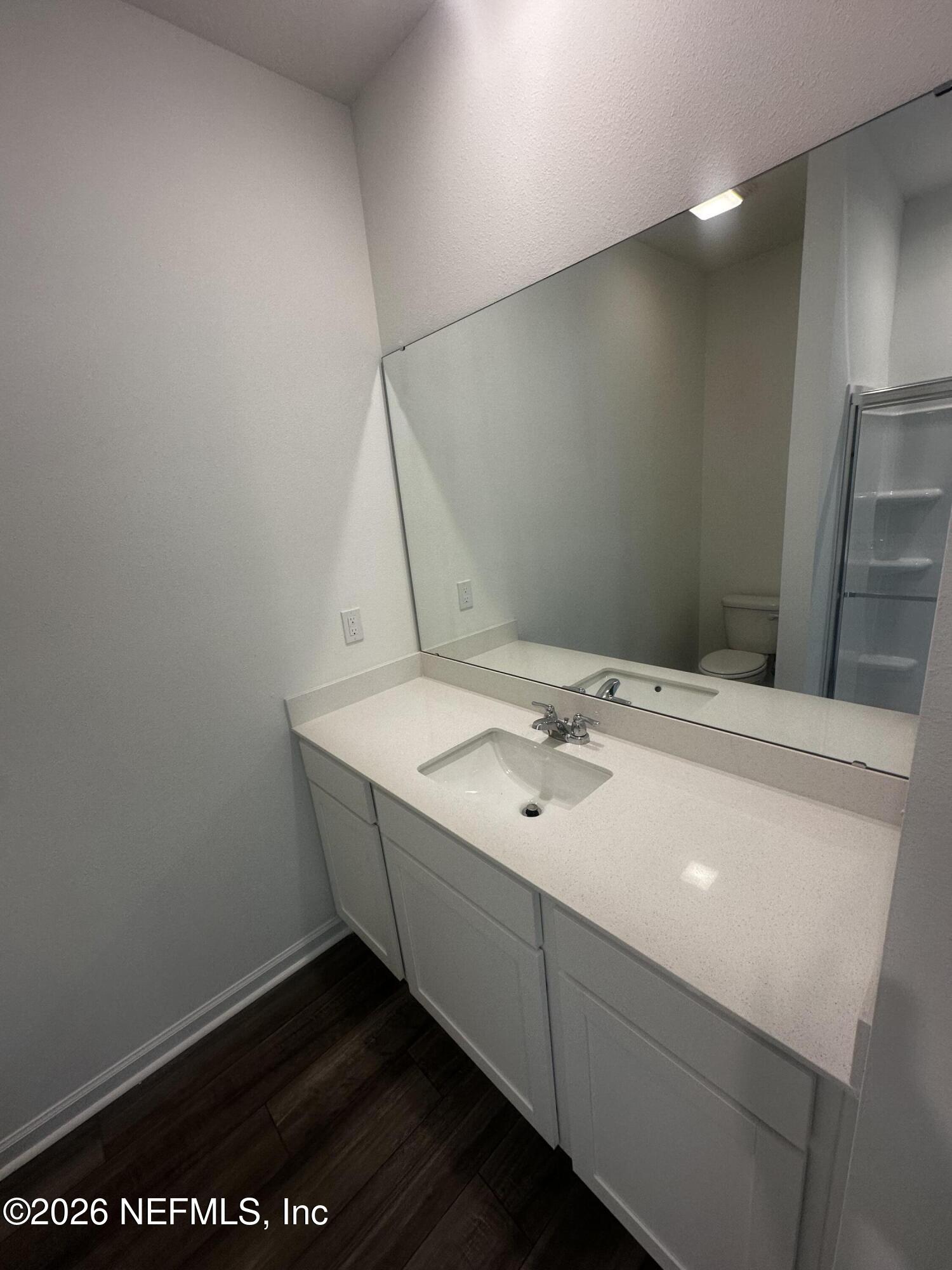54 Oriole Road Palm Coast, FL 32137 - Photo 11 of 23 a bathroom with a sink and a mirror