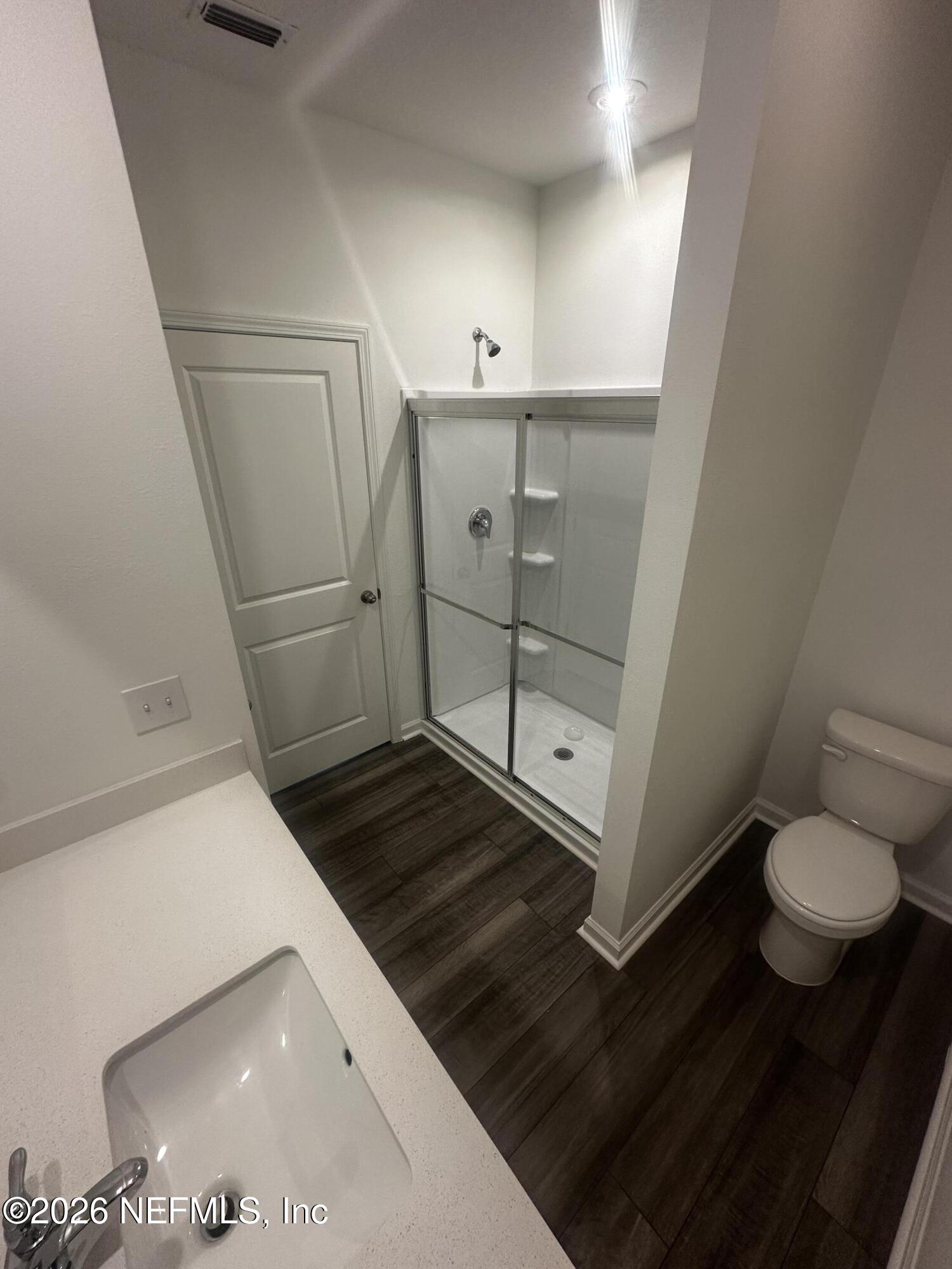 54 Oriole Road Palm Coast, FL 32137 - Photo 12 of 23 a bathroom with a sink and toilet