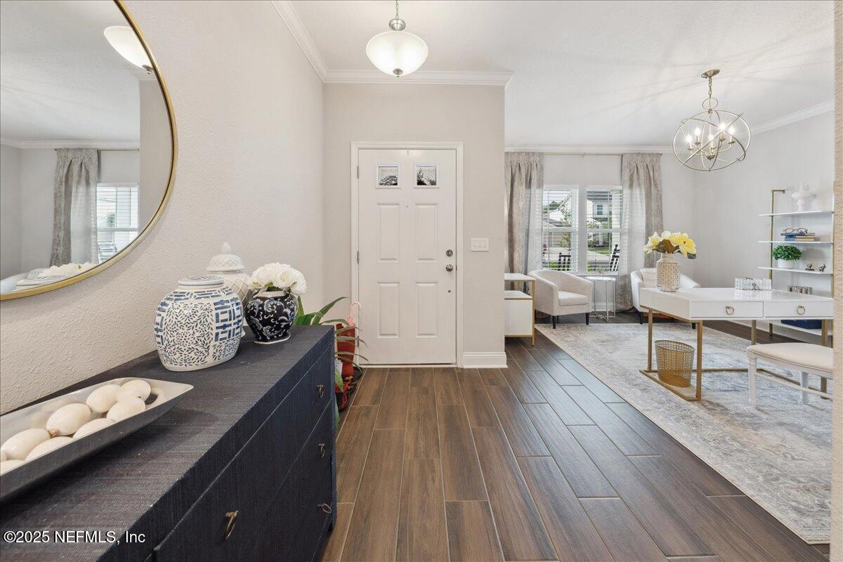 552 Meadow Creek Drive St. Johns, FL 32259 - Photo 2 of 62 a living room with furniture and wooden floor