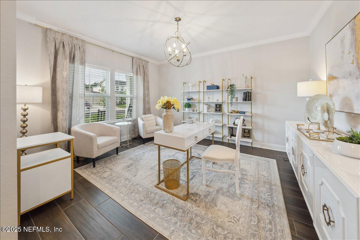 552 Meadow Creek Drive St. Johns, FL 32259 - Photo 29 of 62 a living room with furniture and a chandelier