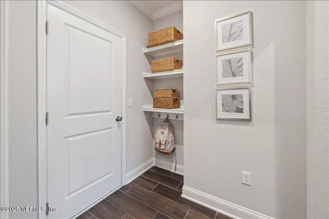a view of a chair and tables in the patio
