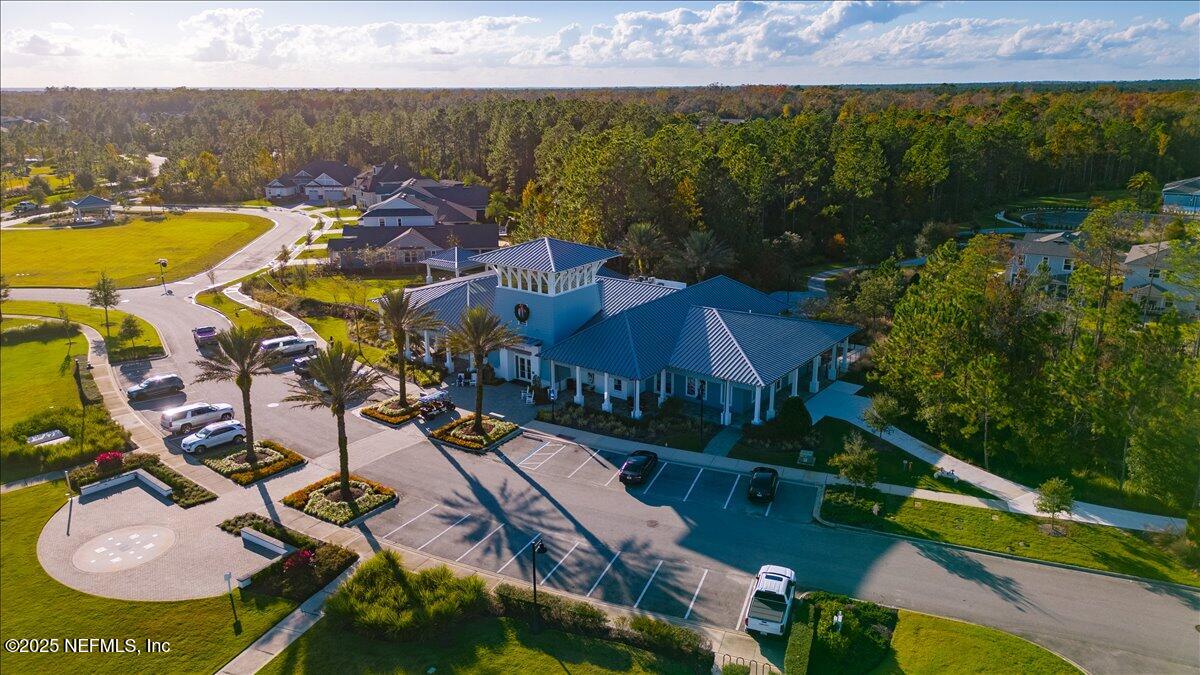 552 Meadow Creek Drive St. Johns, FL 32259 - Photo 45 of 62 an aerial view of residential houses with outdoor space and swimming pool