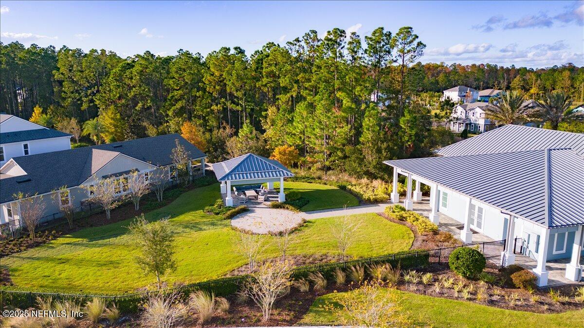 552 Meadow Creek Drive St. Johns, FL 32259 - Photo 50 of 62 an aerial view of a house with swimming pool patio and outdoor seating