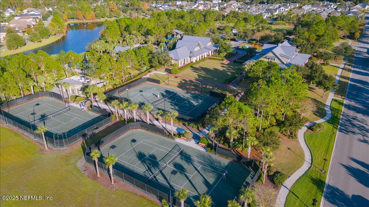 552 Meadow Creek Drive St. Johns, FL 32259 - Photo 56 of 62 an aerial view of a house with a swimming pool