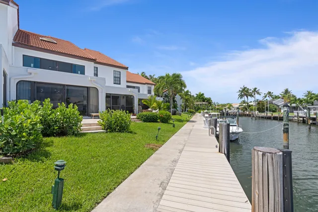 a house with river in front of it
