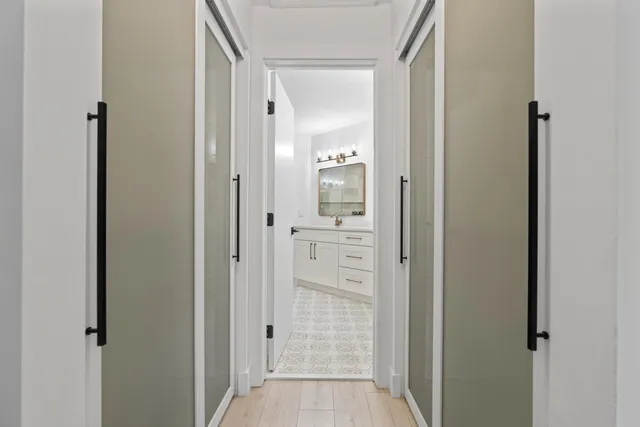 a bathroom with a shower and toilet