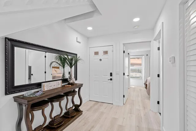 a view of room with painting on the wall