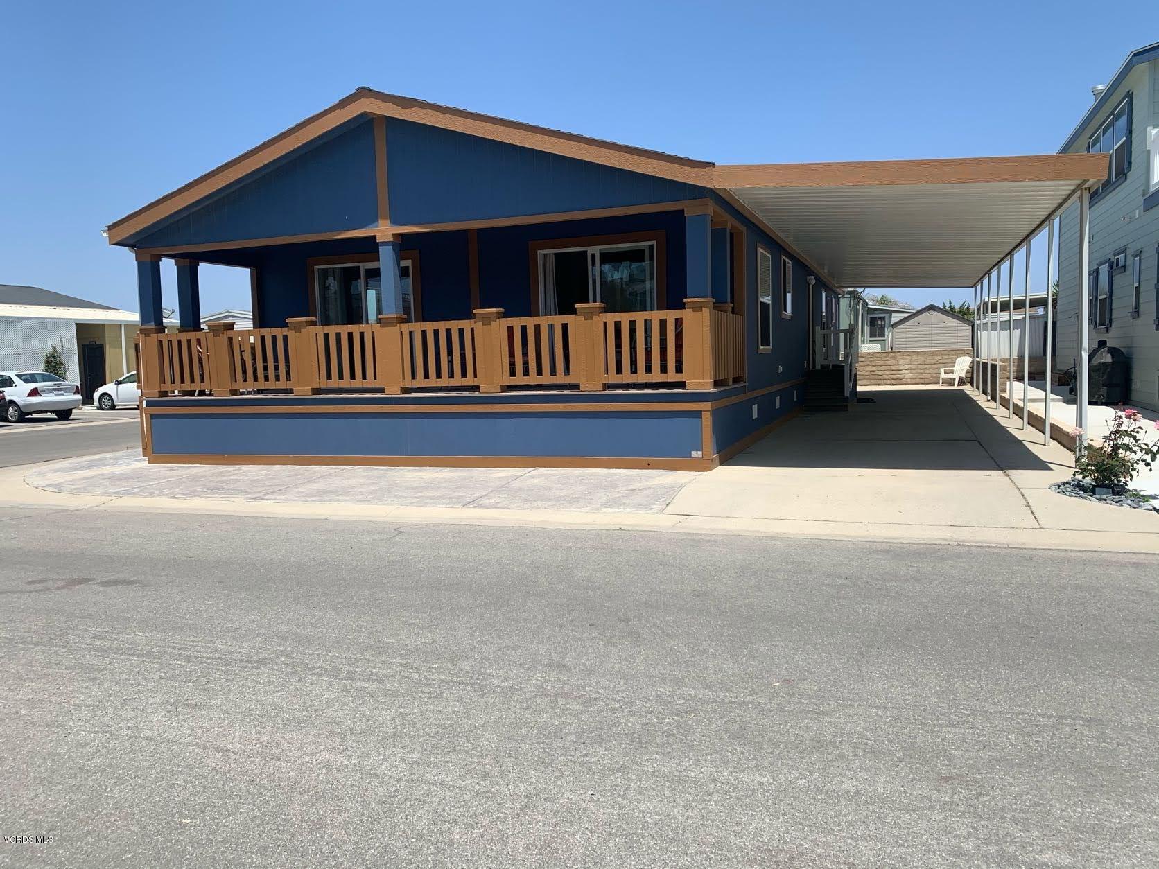 5540 West 5th Street, Unit 158 Oxnard, CA 93035 - Photo 1 of 32 a view of street along with house and deck