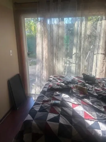 a view of room with window and outdoor space