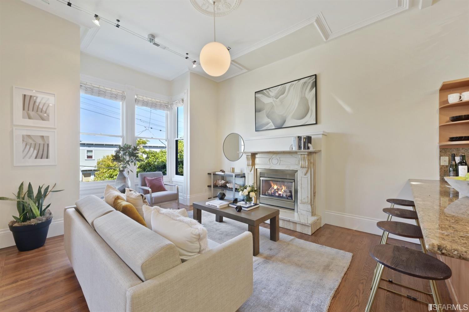 1663 Turk Street San Francisco, CA 94115 - Photo 1 of 27 a living room with furniture and a potted plant
