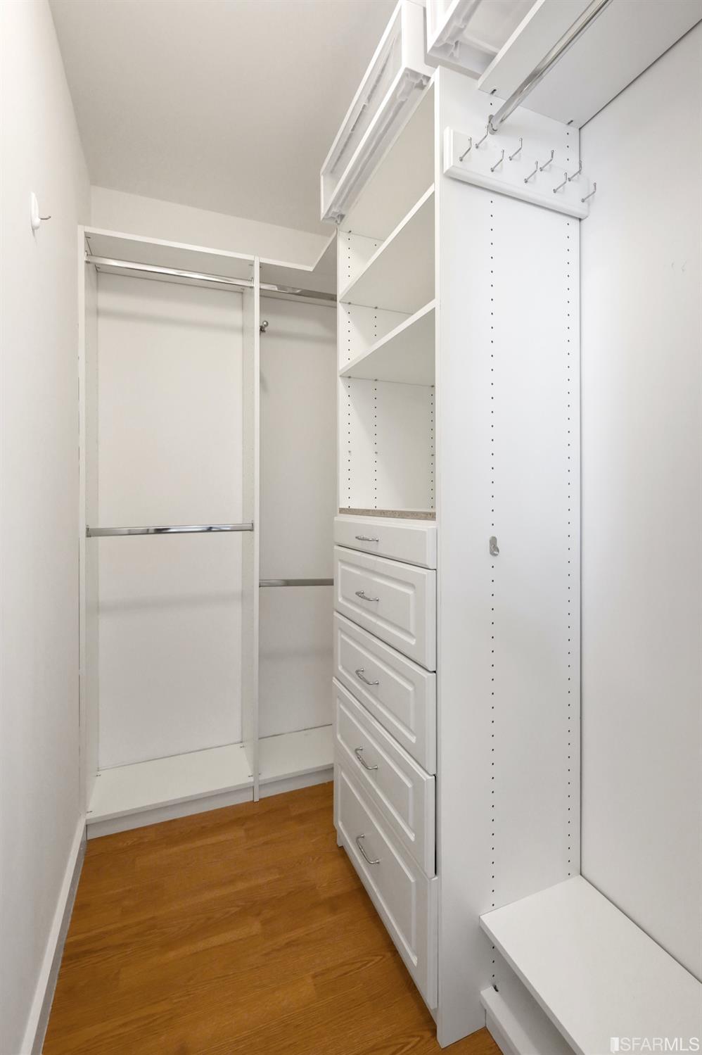 1663 Turk Street San Francisco, CA 94115 - Photo 20 of 27 a view of walk in closet with empty racks