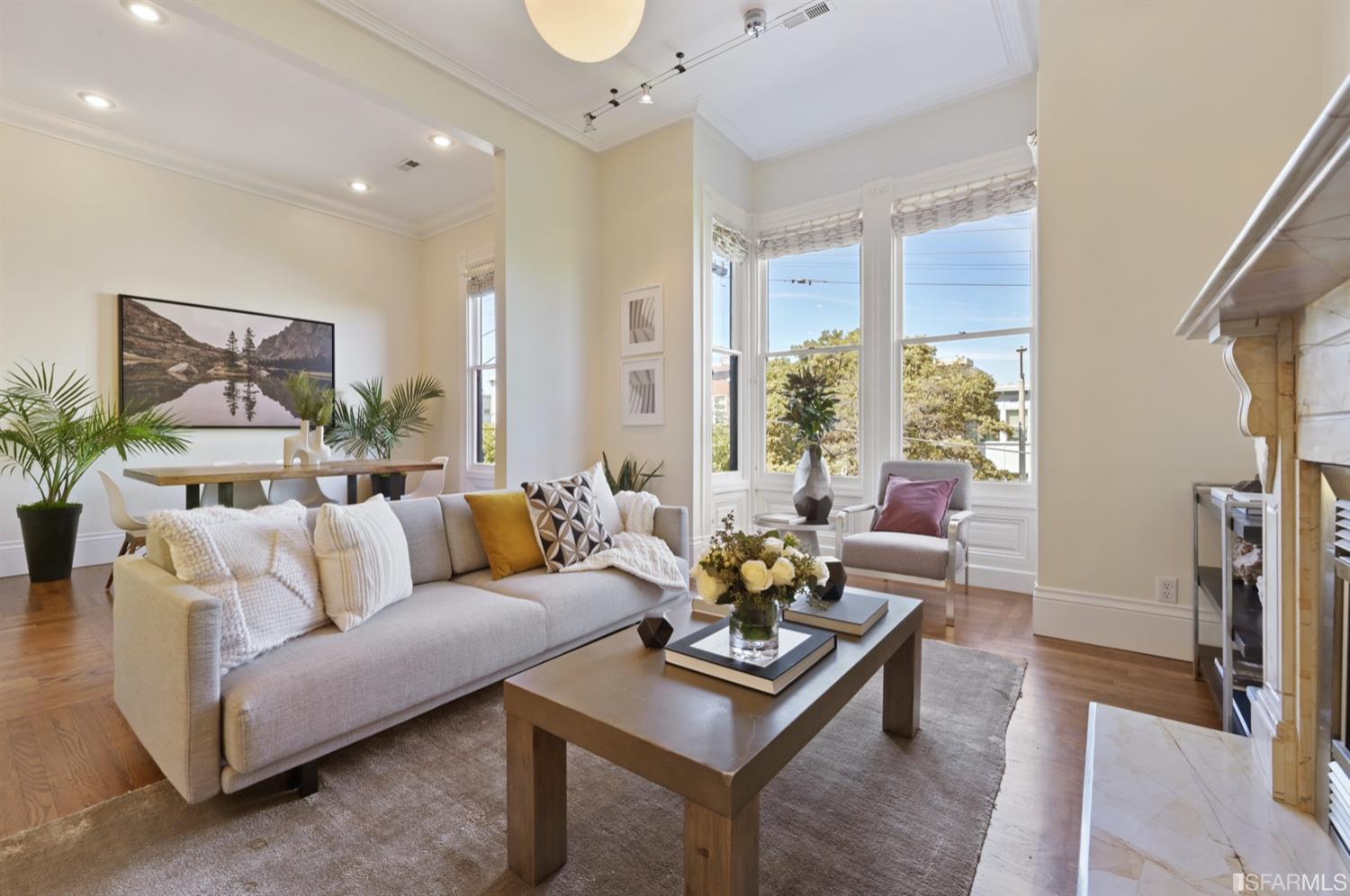 1663 Turk Street San Francisco, CA 94115 - Photo 4 of 27 a living room with furniture and a large window