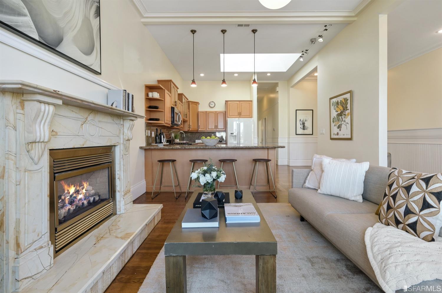 1663 Turk Street San Francisco, CA 94115 - Photo 6 of 27 a living room with furniture and a fireplace