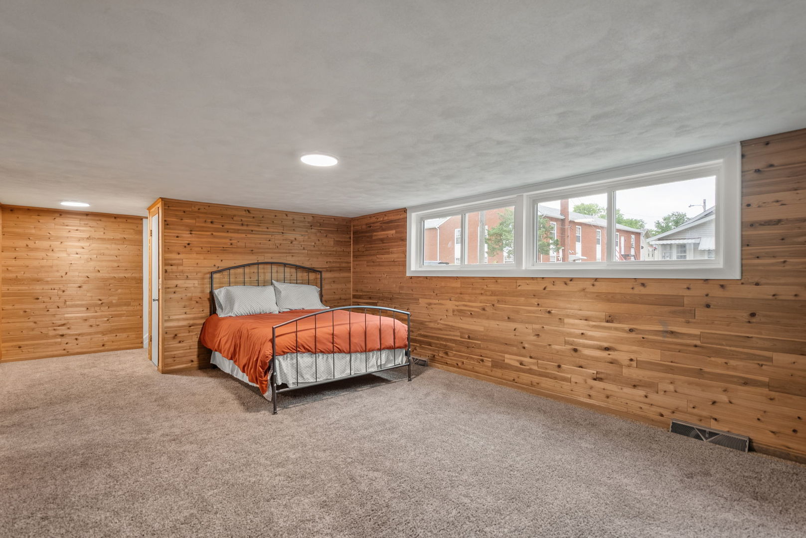 1435 26th Avenue Moline, IL 61265 - Photo 22 of 38 a spacious bedroom with a bed and a flat screen tv