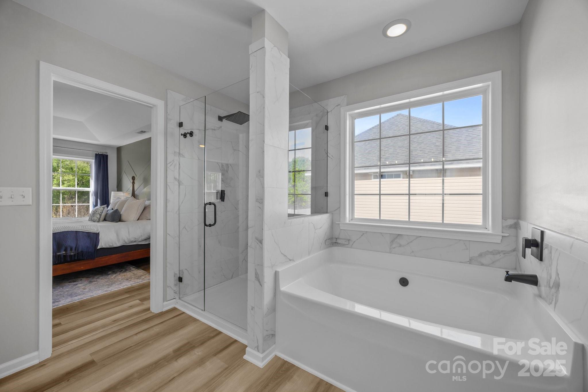 347 Wildbriar Road, Unit 28 Fletcher, NC 28732 - Photo 27 of 43 a bathroom with a tub shower and sink