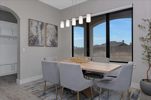 a bed room with a bed and a night stand