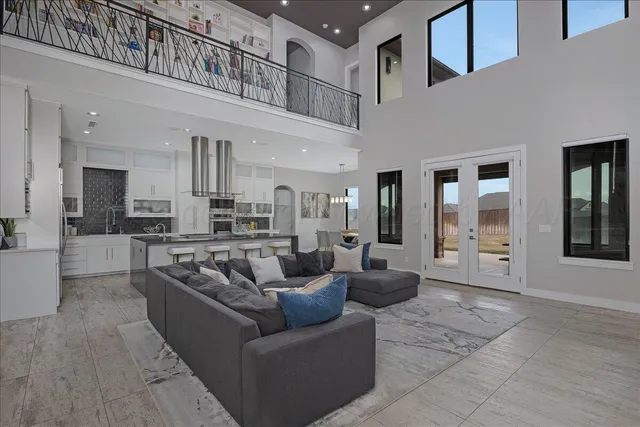 a kitchen with stainless steel appliances granite countertop a sink and cabinets