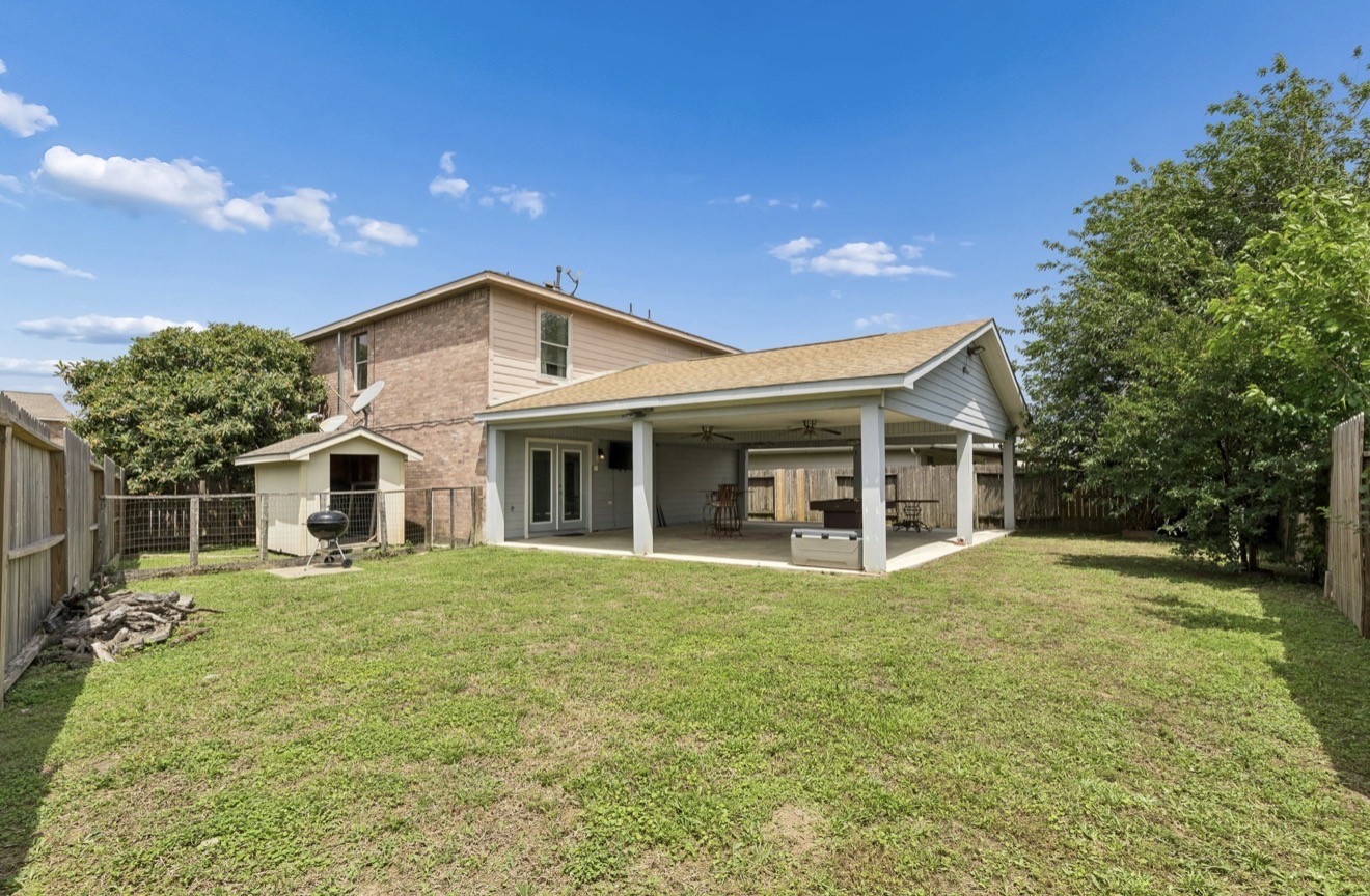 7118 Rising Brook Drive Cypress, TX 77433 - Photo 21 of 21 a front view of a house with a yard