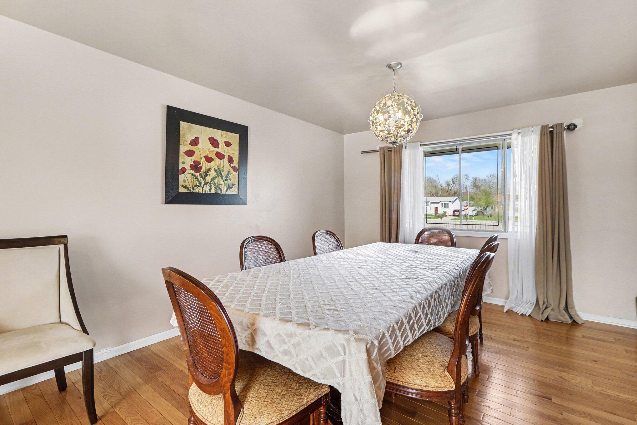 551 Union Place Gary, IN 46403 - Photo 12 of 28 a view of a dining room with furniture window and wooden floor