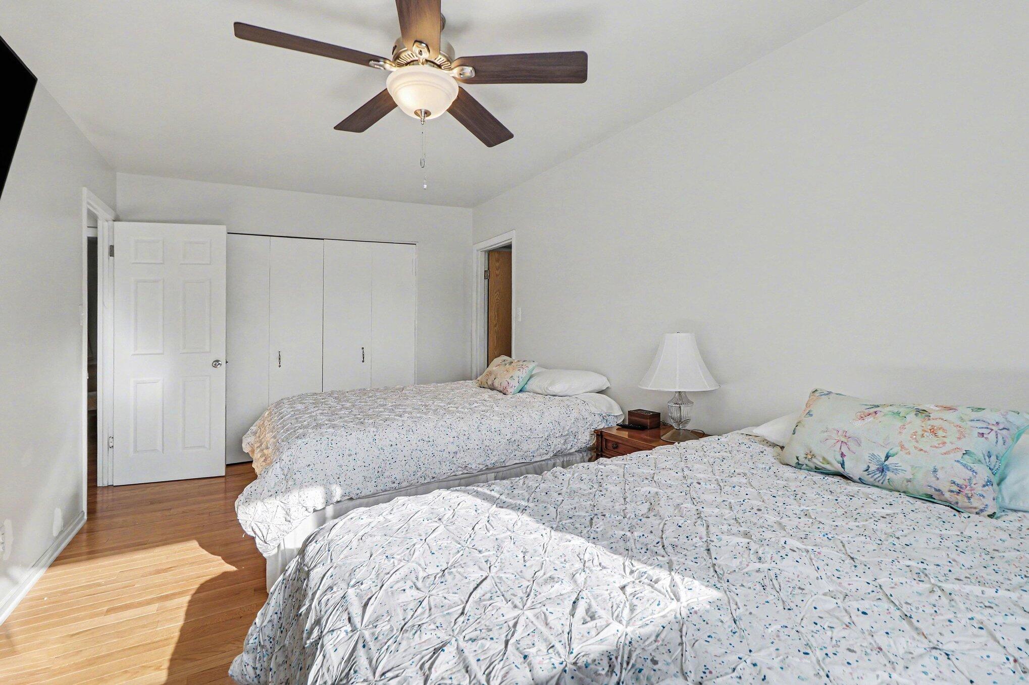 551 Union Place Gary, IN 46403 - Photo 20 of 28 a bedroom with two beds and ceiling fan