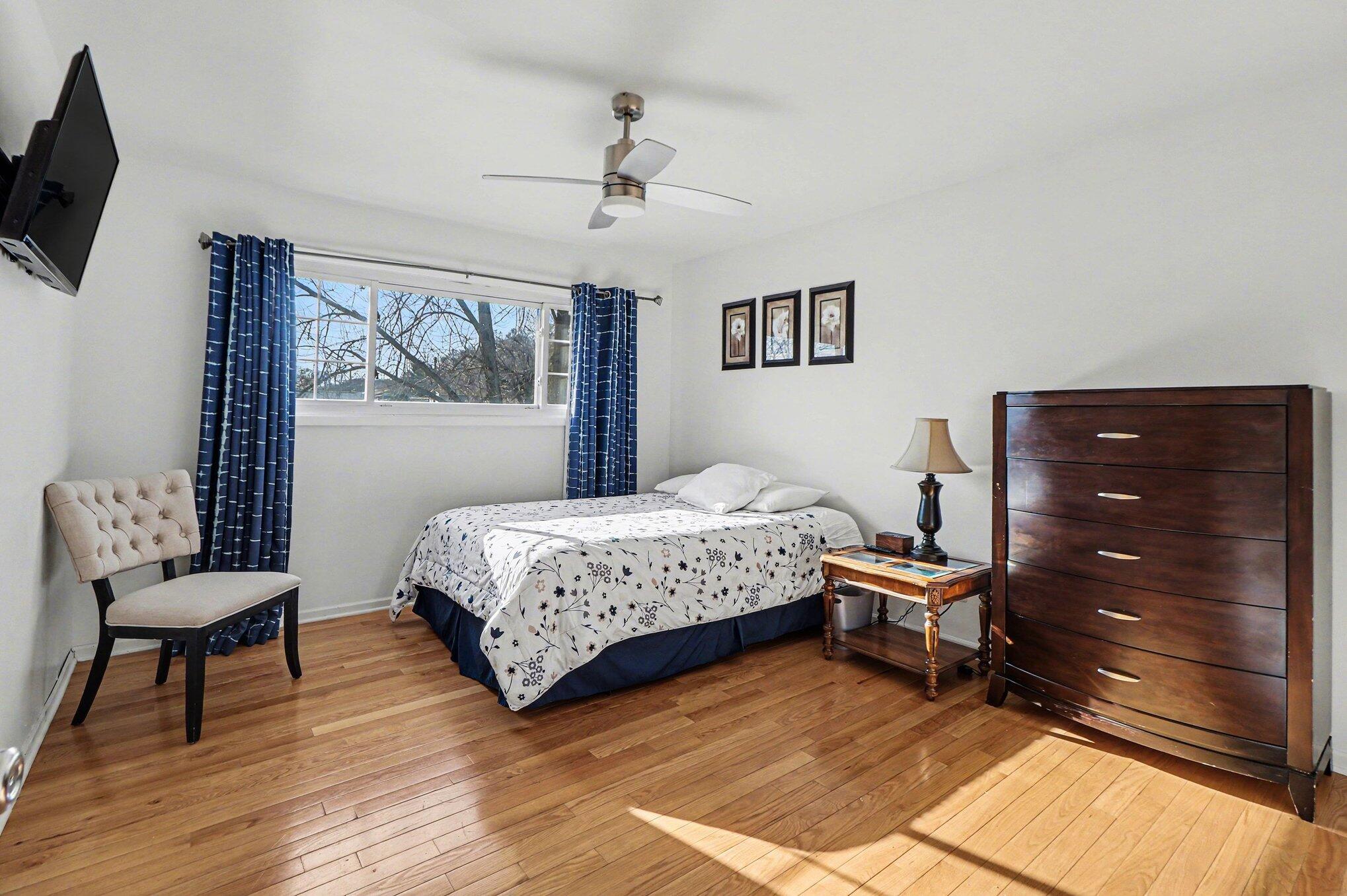 551 Union Place Gary, IN 46403 - Photo 22 of 28 a bedroom with a bed and a chair