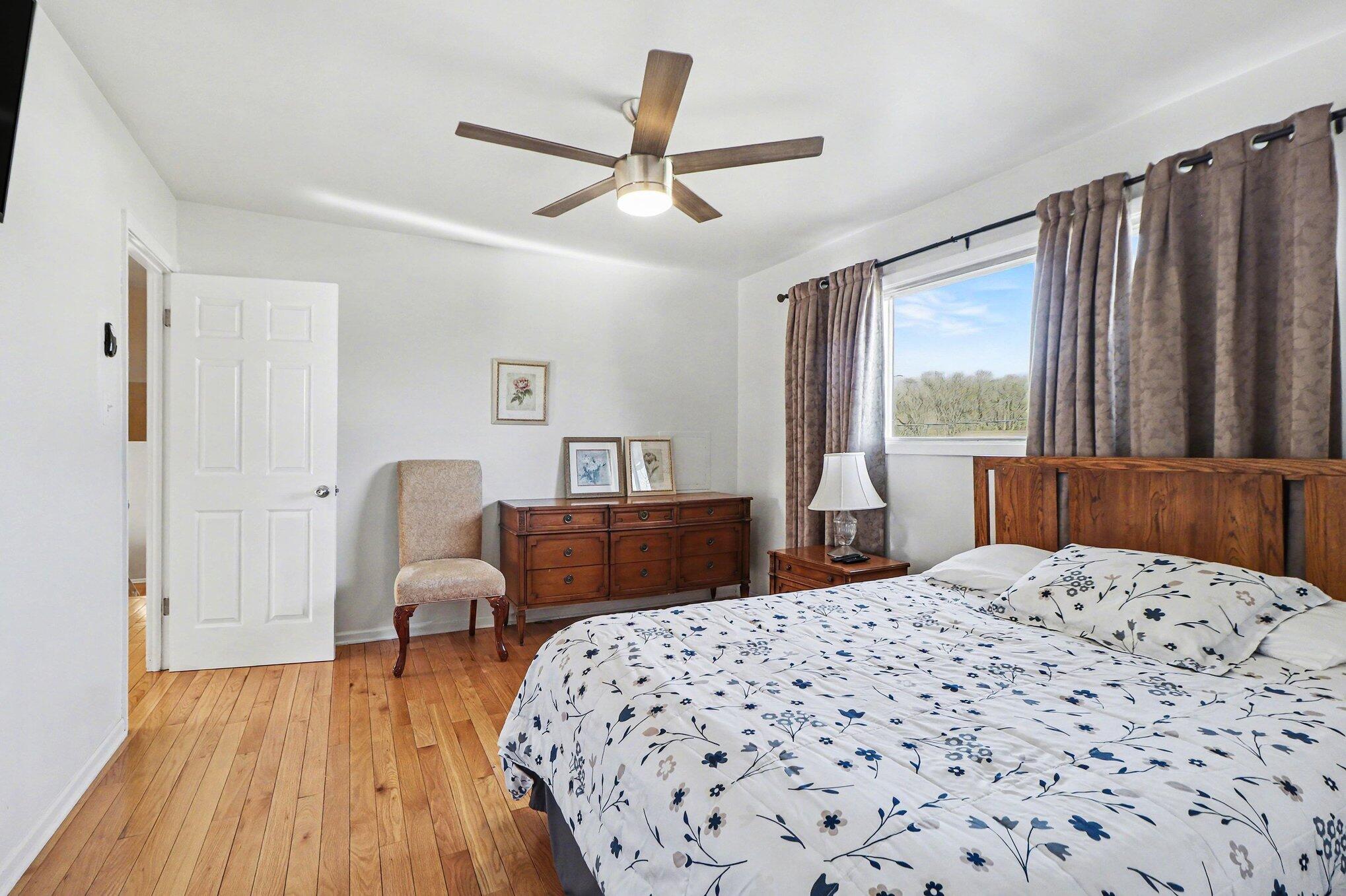 551 Union Place Gary, IN 46403 - Photo 24 of 28 a bed room with a bed and a chair