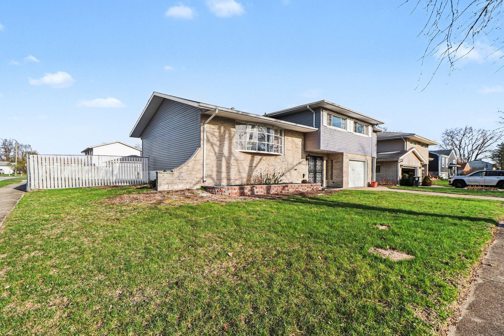 551 Union Place Gary, IN 46403 - Photo 28 of 28 a house view with a garden space