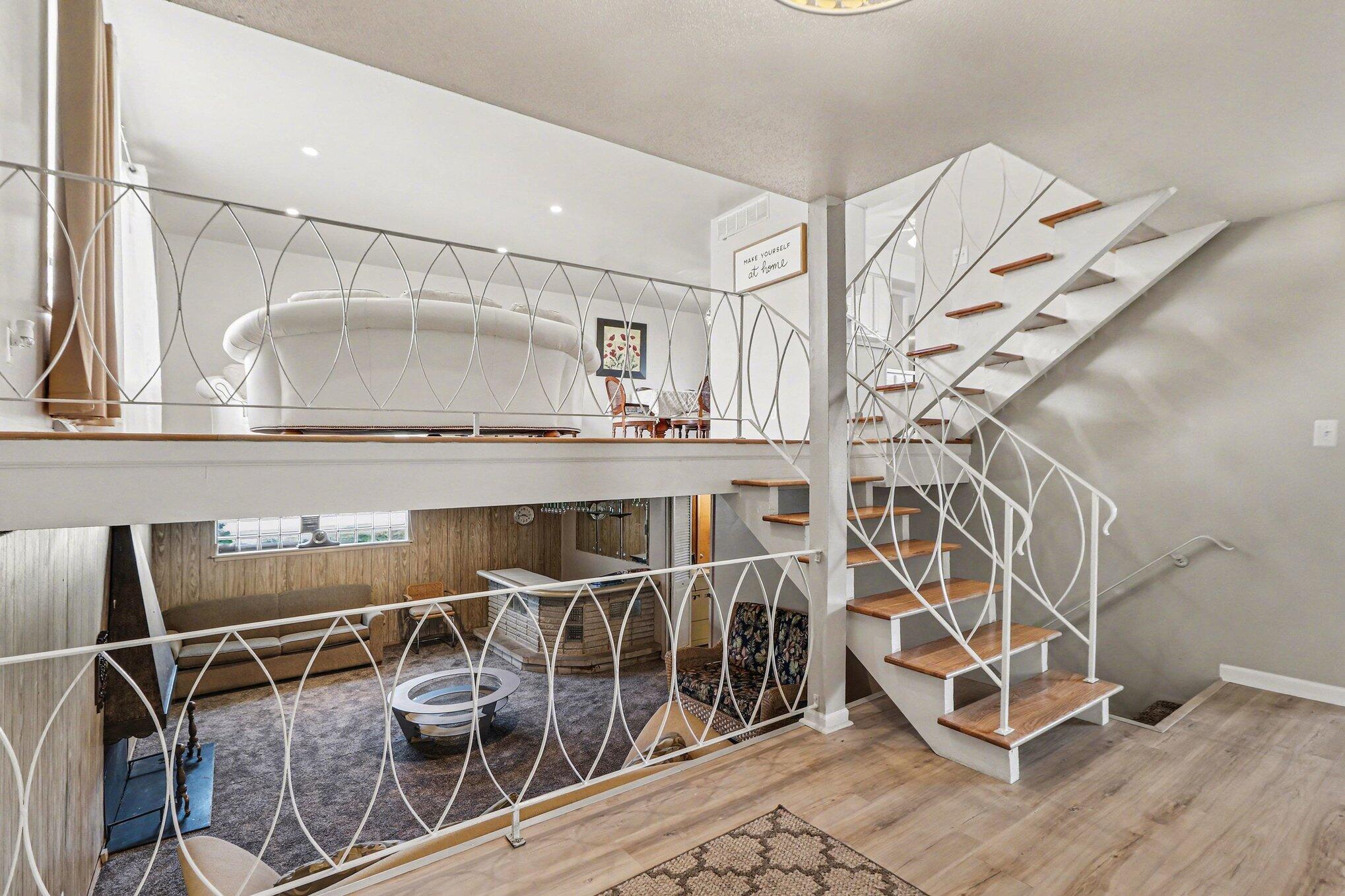 551 Union Place Gary, IN 46403 - Photo 3 of 28 an empty room with wooden floor and windows