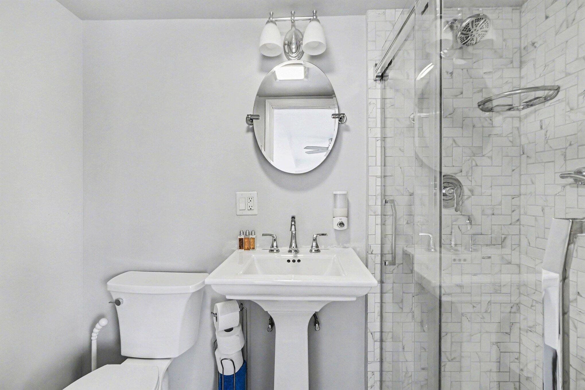 551 Union Place Gary, IN 46403 - Photo 7 of 28 a bathroom with a sink a toilet and a mirror