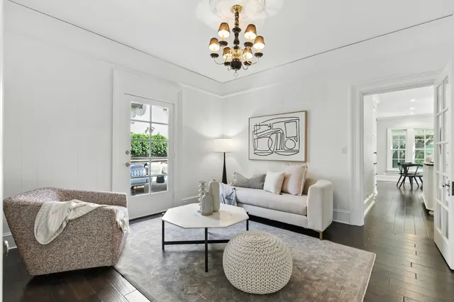 a bathroom with a sink toilet and mirror