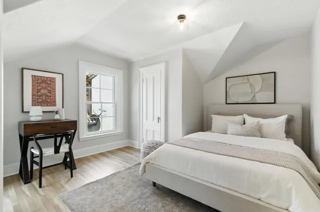 a view of a patio with table and chairs and potted plants