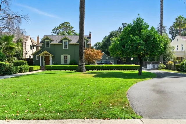 a view of a house with a park