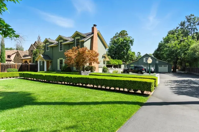 a view of a house with a big yard