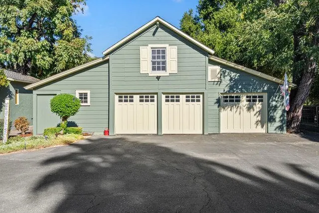 a view of an entryway with wooden floor and stairs