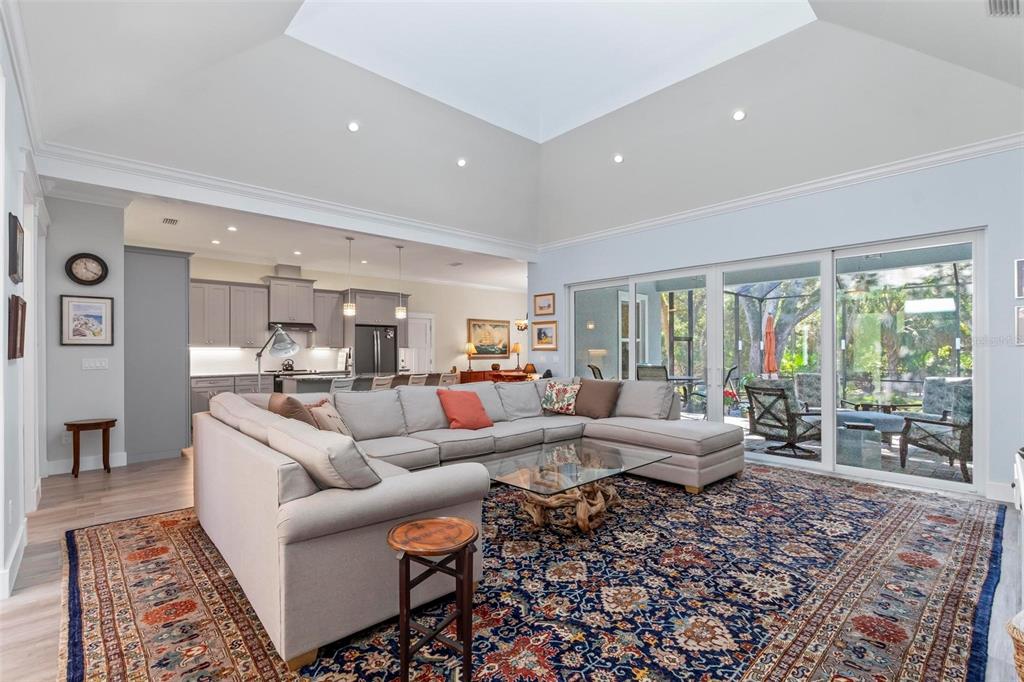 65 Sandy Beach Way Palm Coast, FL 32137 - Photo 15 of 85 a living room with furniture and a large window