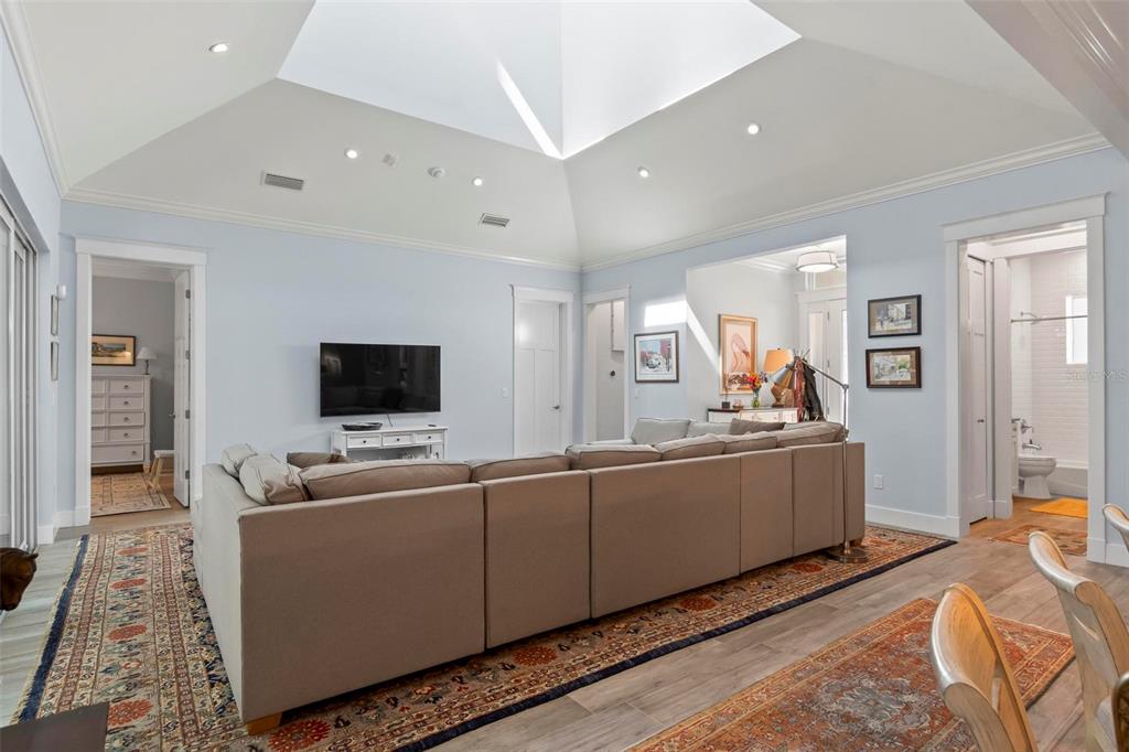 65 Sandy Beach Way Palm Coast, FL 32137 - Photo 17 of 85 a living room with furniture and a flat screen tv