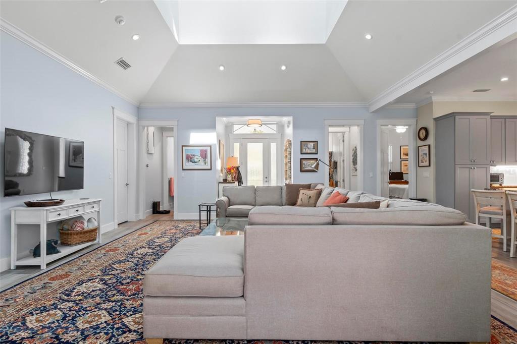 65 Sandy Beach Way Palm Coast, FL 32137 - Photo 21 of 85 a living room with furniture and a flat screen tv