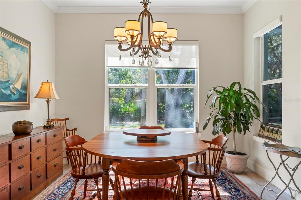 65 Sandy Beach Way Palm Coast, FL 32137 - Photo 51 of 85 a dining room with furniture and window