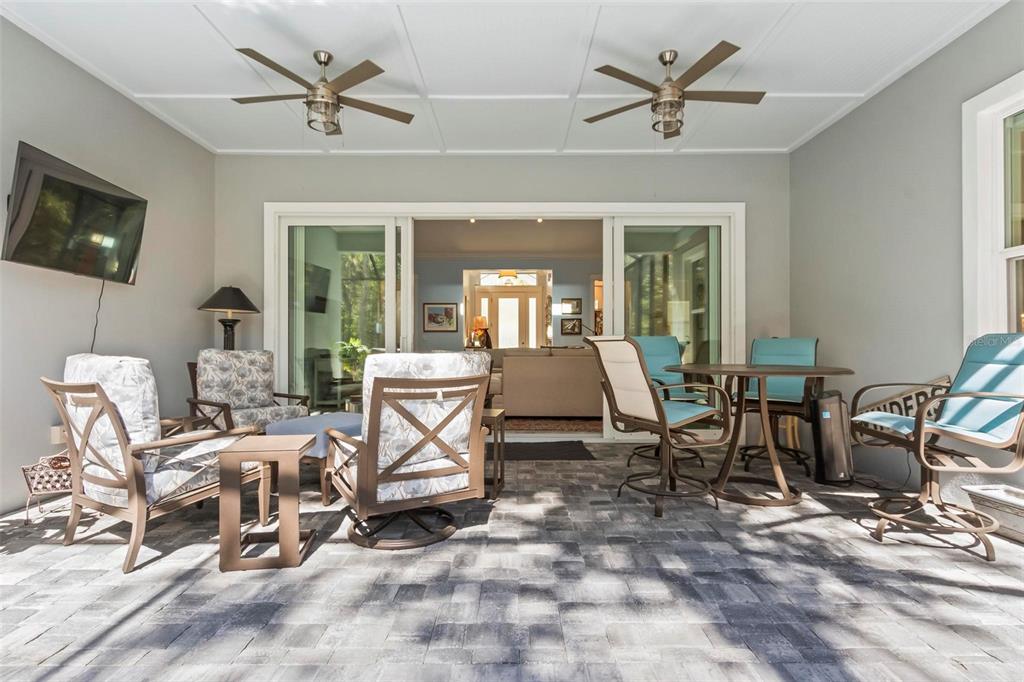 65 Sandy Beach Way Palm Coast, FL 32137 - Photo 76 of 85 a living room with furniture a flat screen tv and a window