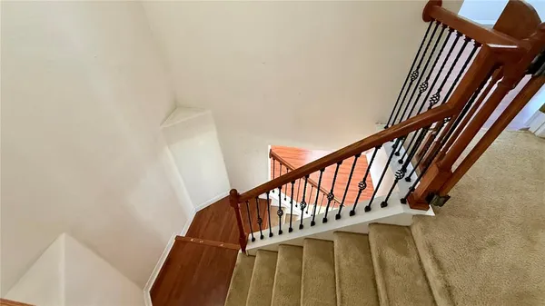 a view of entryway with wooden floor