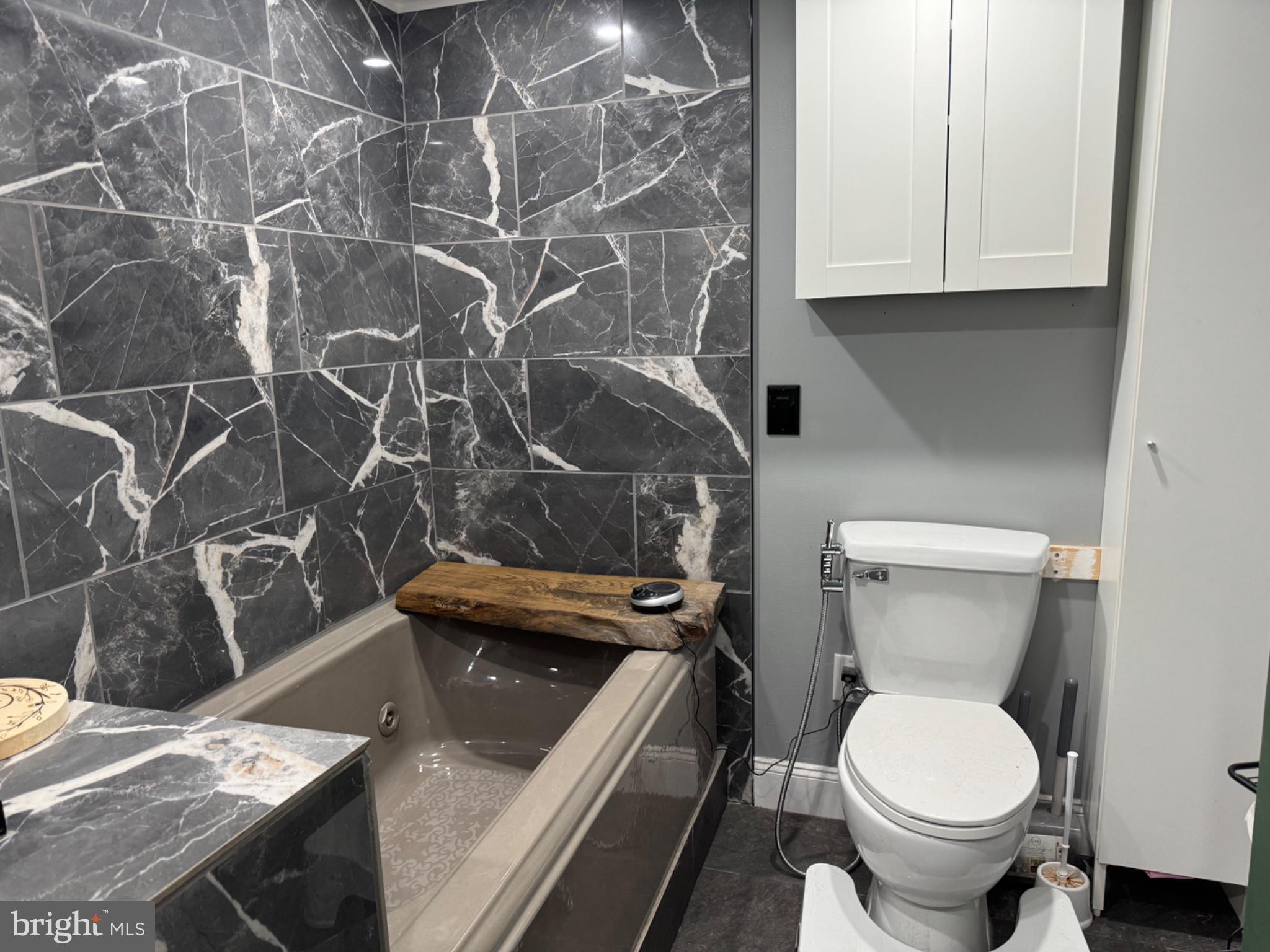 2727 Durham Road Doylestown, PA 18902 - Photo 24 of 32 a bathroom with a granite countertop toilet and a sink
